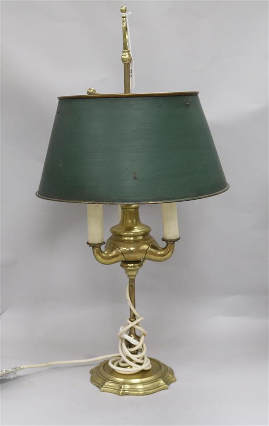 A brass bouillotte style lamp, with shade